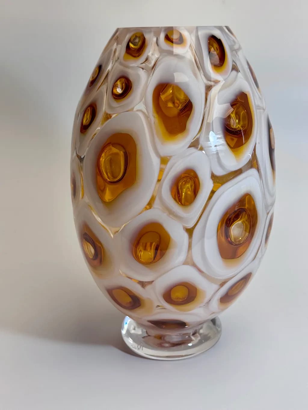 Amber Elegance: A Handcrafted Glass Vase with Organic Patterns and Warm Hues