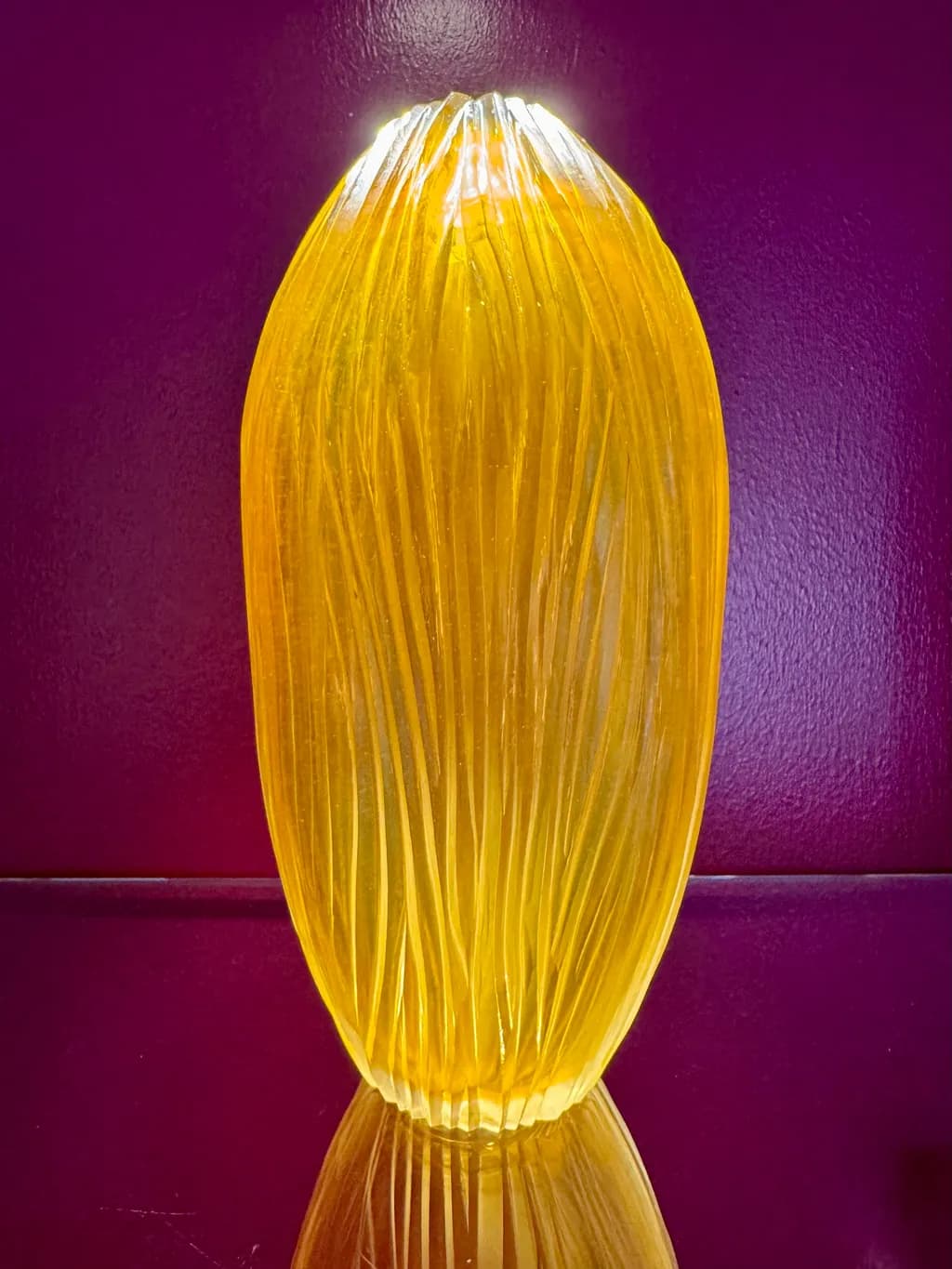 Golden Harmony: A Textured Glass Vase Illuminating Elegance and Warmth