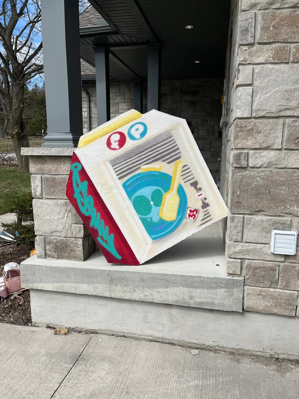 Urban Whimsy: A Playful Graffiti-Inspired Milk Carton Sculpture for Creative Spaces