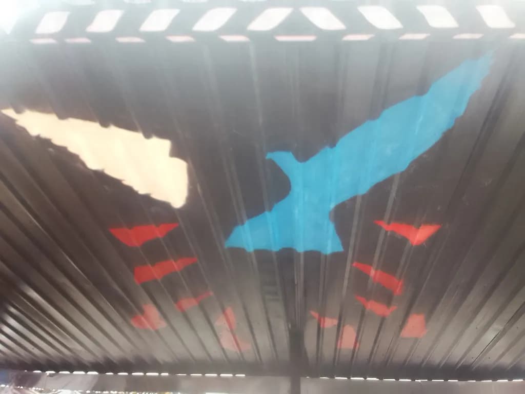 Vibrant Flight: An Abstract Mural of Colorful Freedom