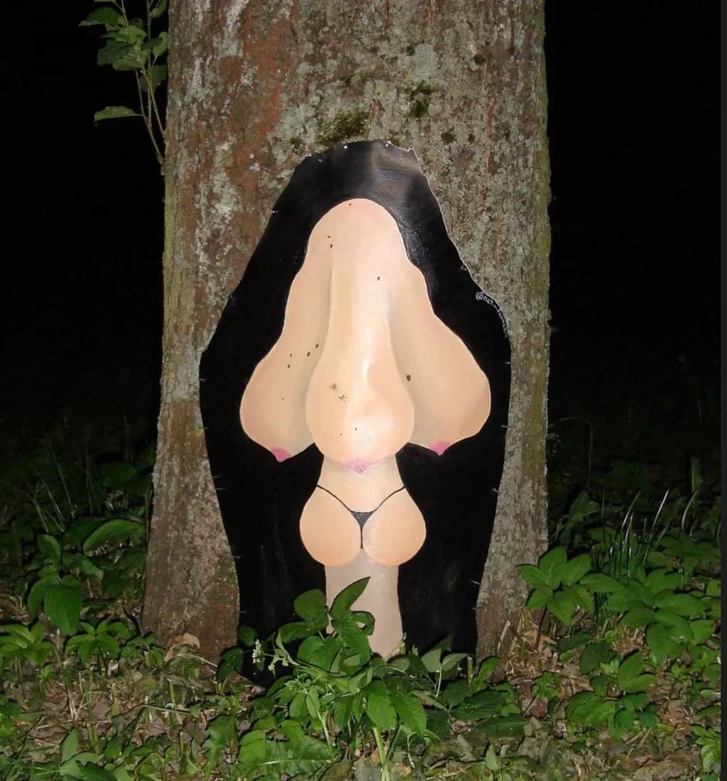 Whimsical Nature: A Playful Fusion of Art and Tree Trunk