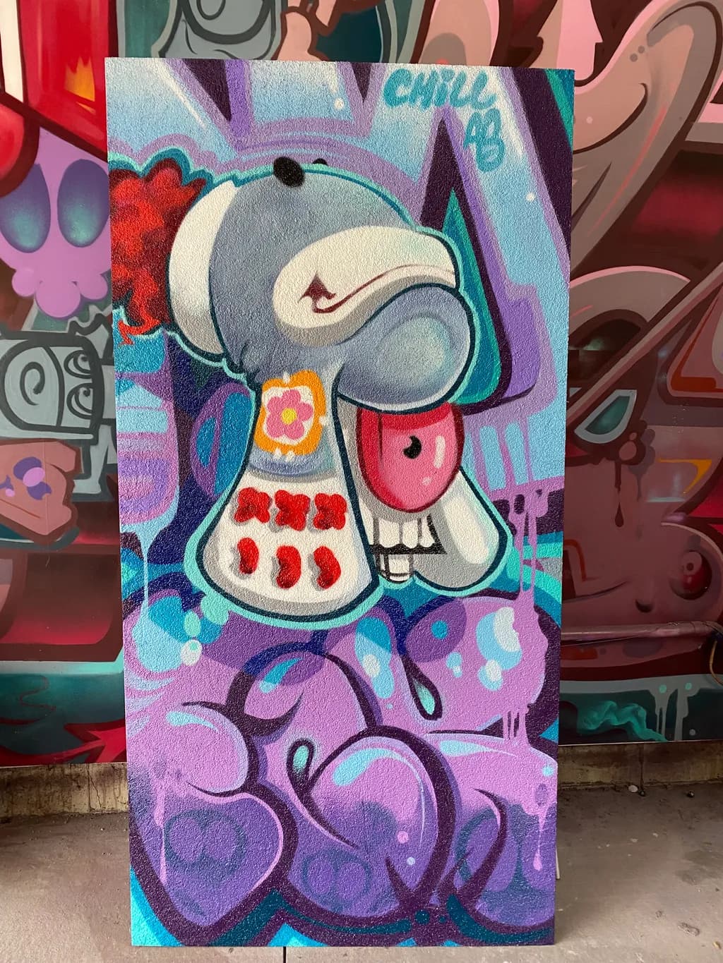Whimsical Dreams: A Playful Encounter with Colorful Characters in Urban Art