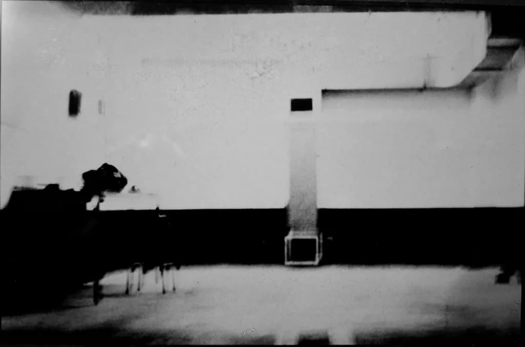 Monochrome Echoes: An Abstract Exploration of Empty Spaces and Contrasting Shadows