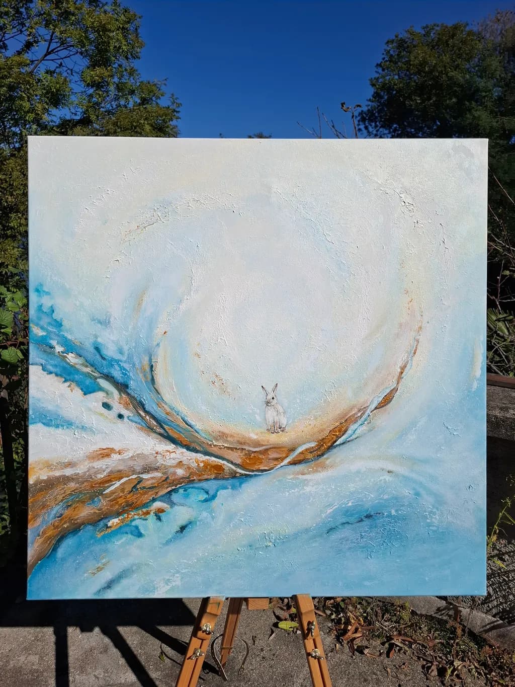Whispers of Serenity: A Tranquil Rabbit Amidst the Swirling Tides of Nature