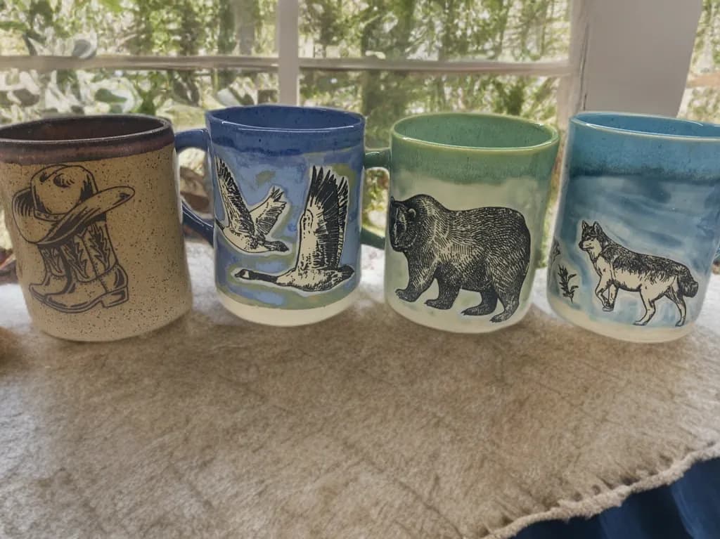 Rustic Wildlife Mugs: Handcrafted Ceramic Art Featuring Boots, Bears, and Birds