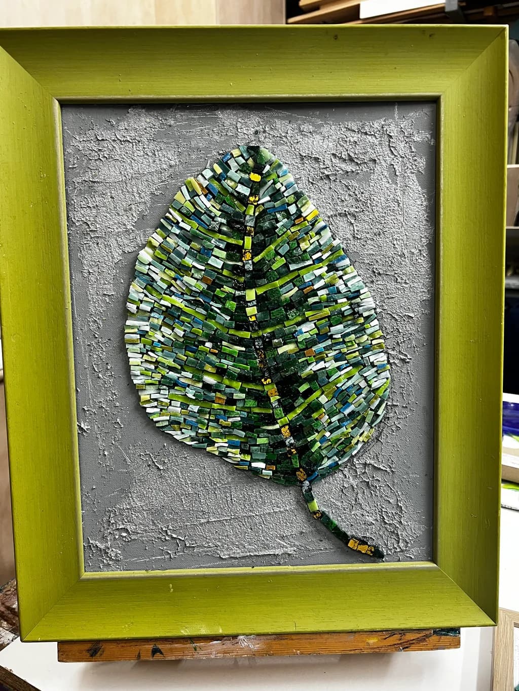 Whispers of Nature: A Mosaic Leaf in Vibrant Greens and Textured Elegance