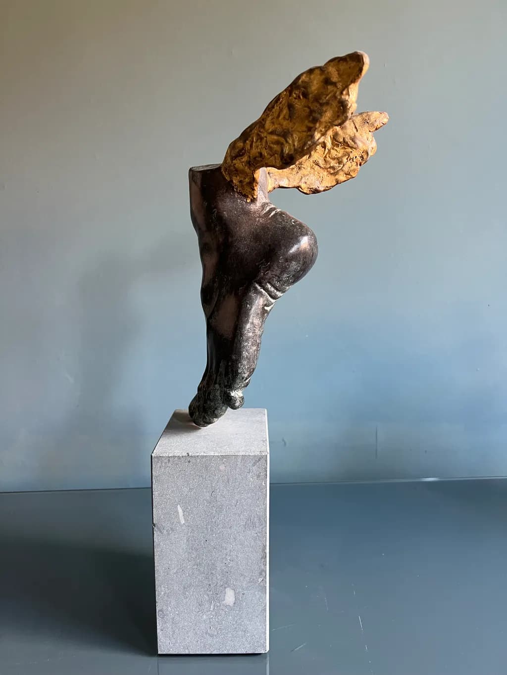 Ethereal Embrace: A Dance of Form and Texture in Bronze and Gold
