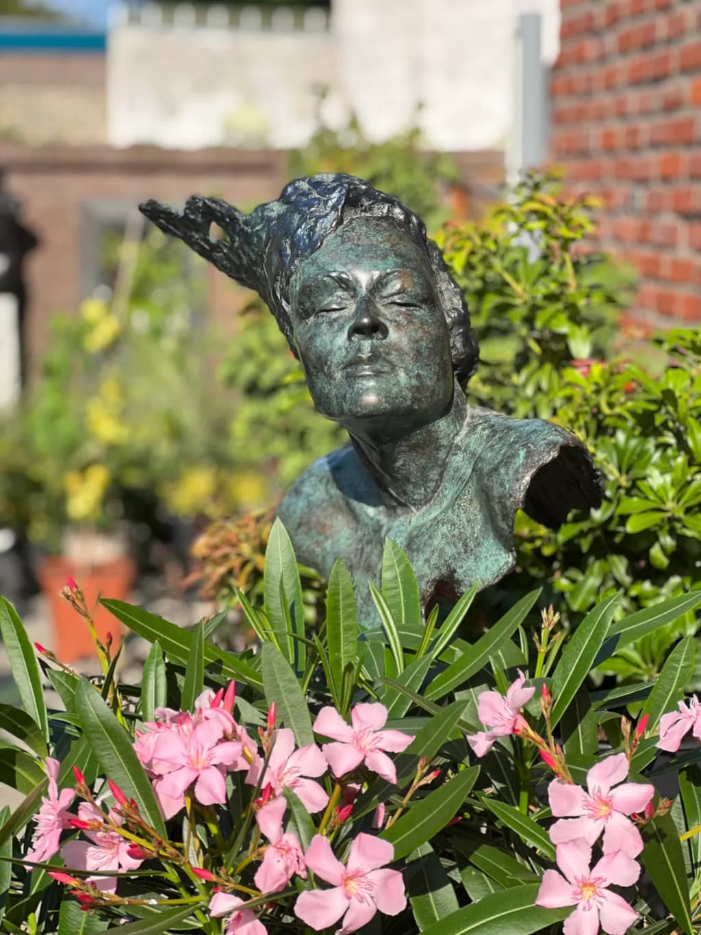 Whispers of Nature: A Bronze Bust Embraced by Blossoms