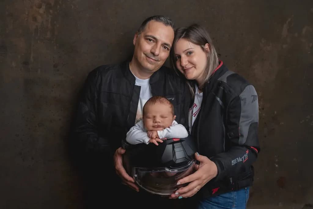 Family Love in a Helmet: A Portrait of Joy and Protection