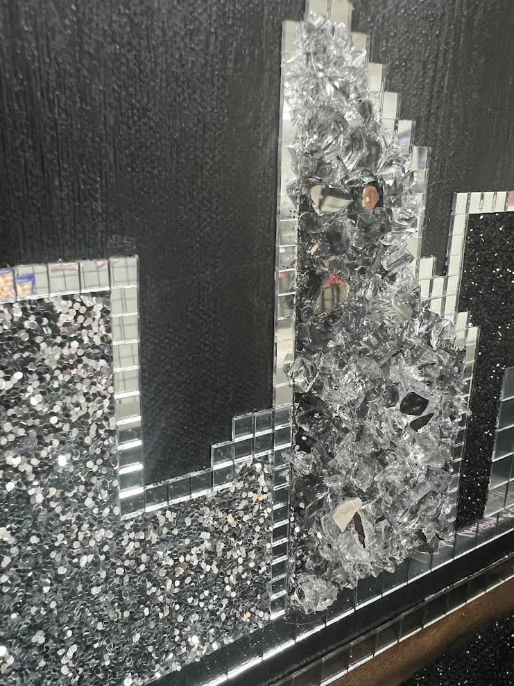 Reflections of Elegance: A Textured Mosaic Journey in Black and Silver
