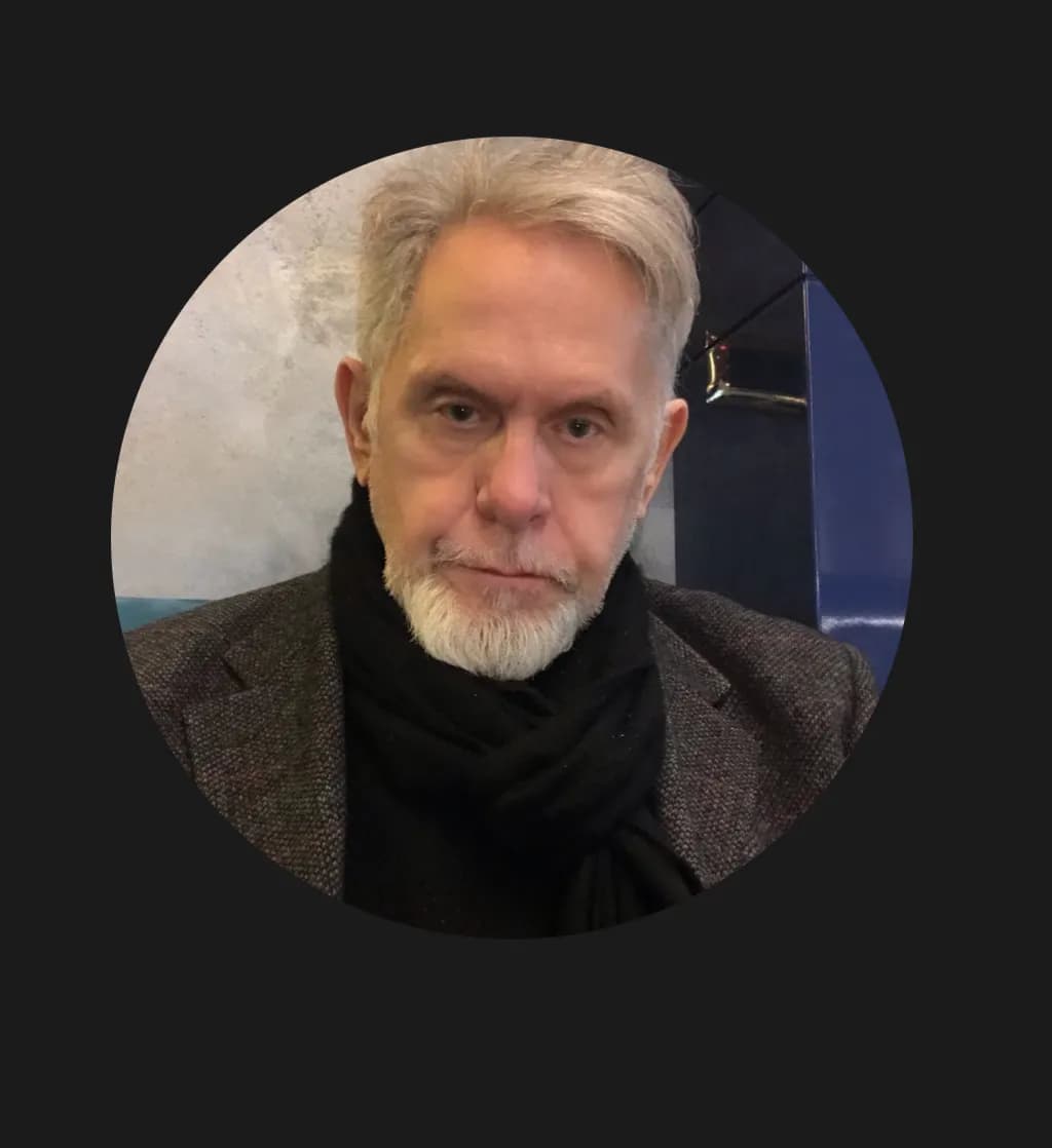 Serious Reflection: A Portrait of a Distinguished Man in Gray Scarf and Beard