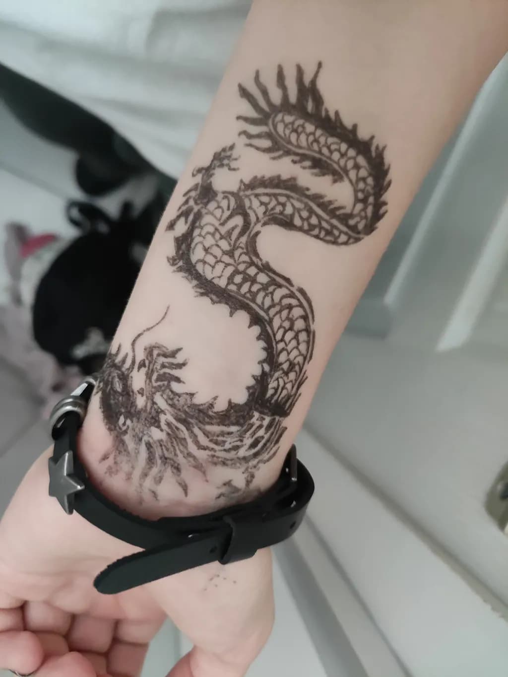 Dragon Ink: A Serpentine Tattoo Design for Body Art Enthusiasts