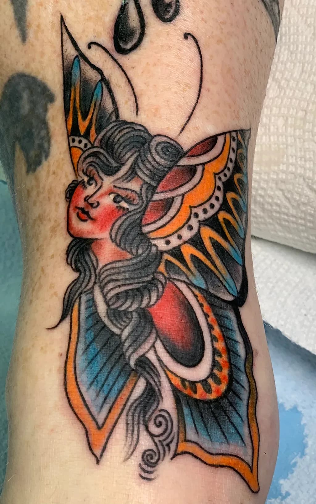 Whimsical Butterfly Maiden: A Colorful Tattoo Artistry Celebration