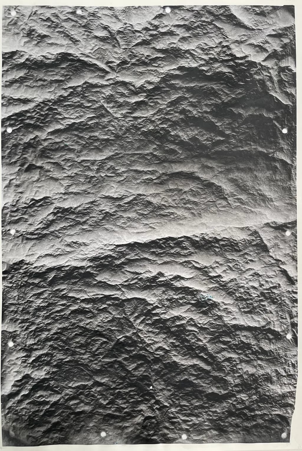 Textured Echoes: A Monochrome Exploration of Surface and Shadow
