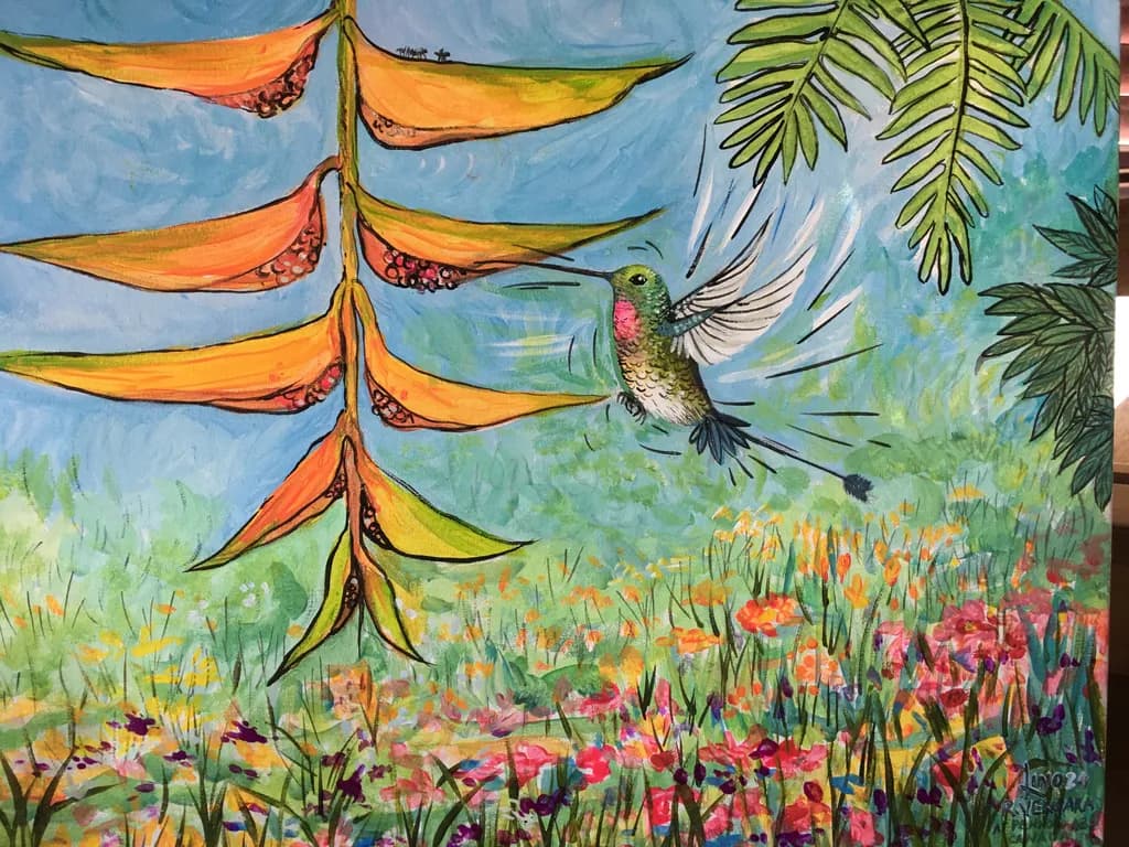 Vibrant Hummingbird Dance Among Colorful Blooms: A Celebration of Nature's Beauty