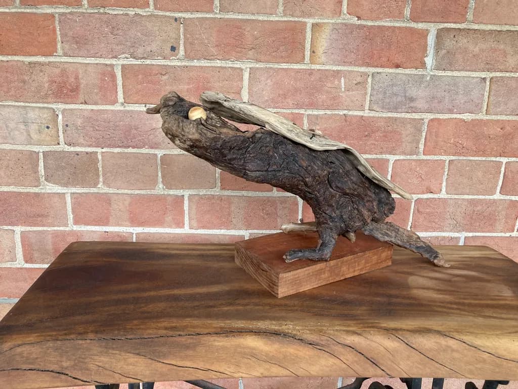 Whimsical Driftwood Creature: Nature's Artistry in Sculpture