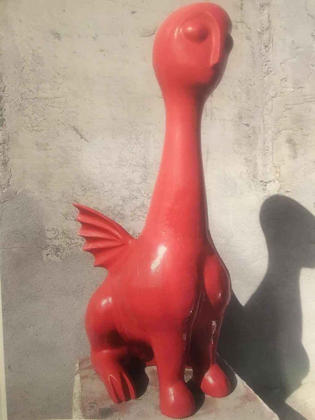 Whimsical Red Dragon: A Playful Sculpture of Imagination and Fantasy