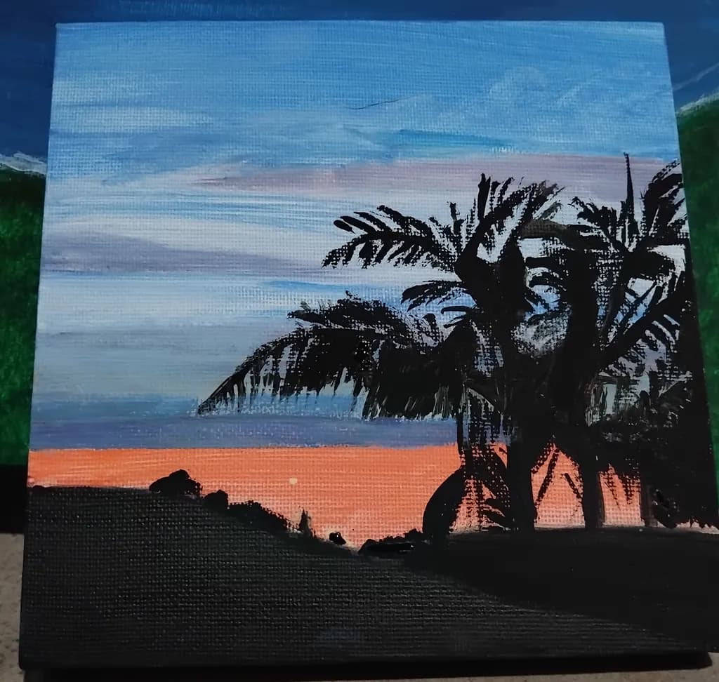 Tropical Twilight: A Serene Sunset Over Palm Silhouettes