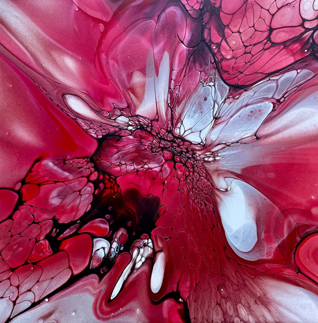 Vibrant Fluidity: An Abstract Dance of Red and Organic Textures