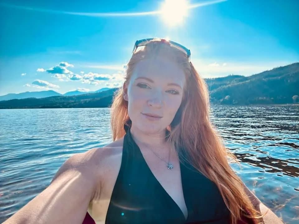 Radiant Reflections: A Serene Moment by the Water's Edge