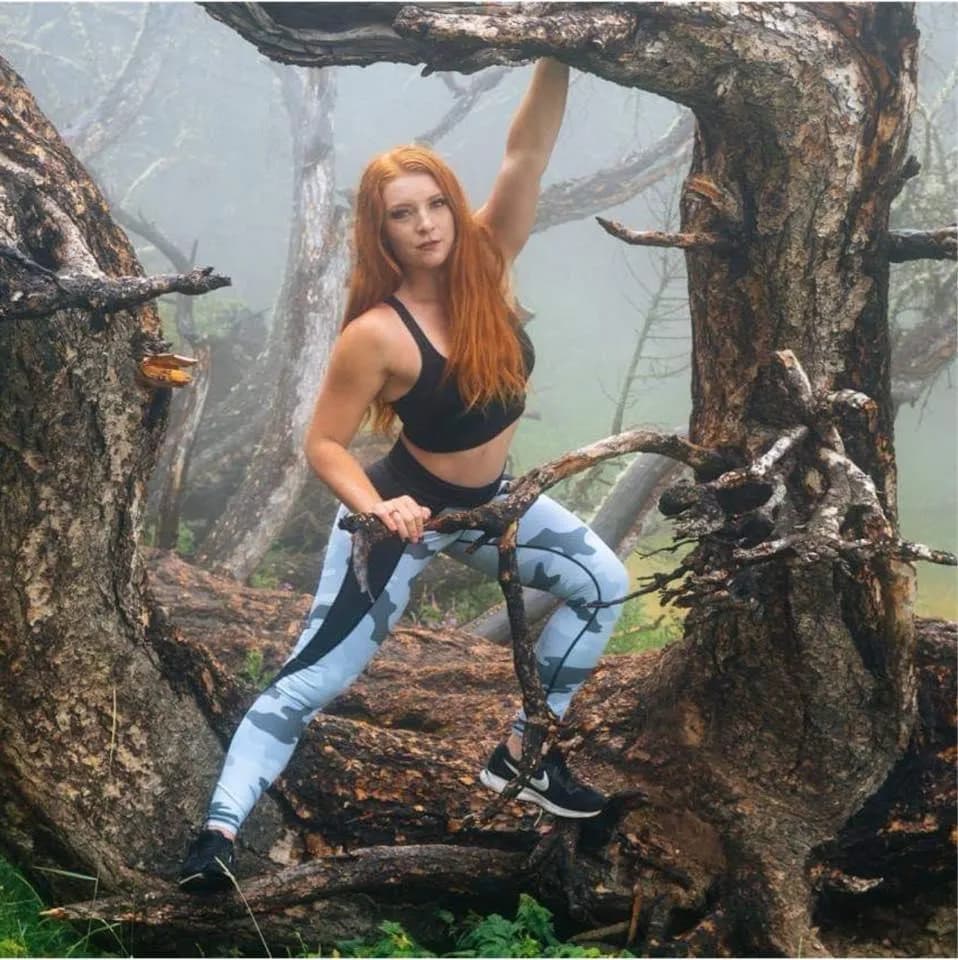 Embracing Nature: A Confident Pose in the Heart of Adventure