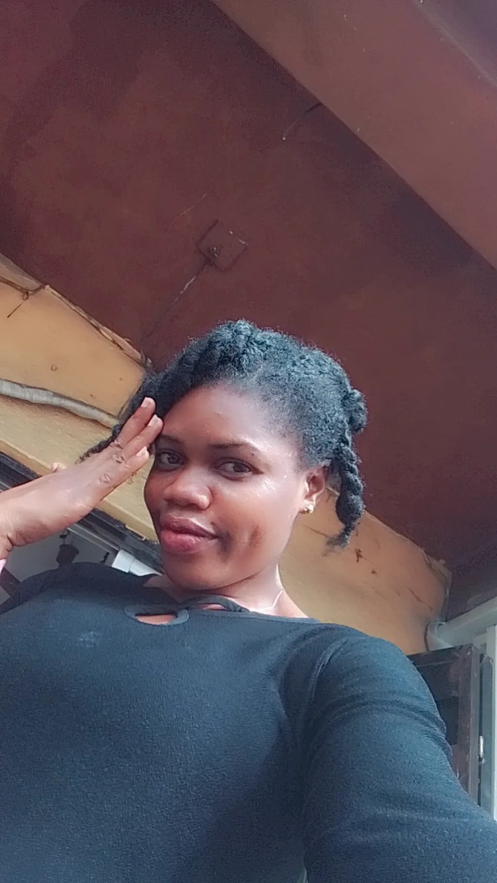Confident Smile: A Portrait of Casual Elegance in Black
