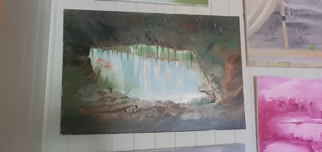 Whispers of Light: A Serene Cave Reflection in Nature's Embrace