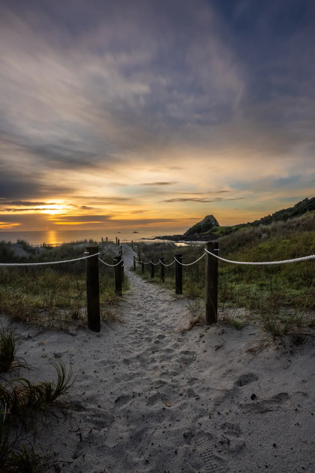 Serene Pathway to Sunset Bliss: A Tranquil Beach Landscape Experience