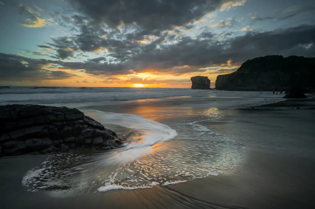 Whispers of Twilight: A Serene Sunset Over the Ocean Shoreline