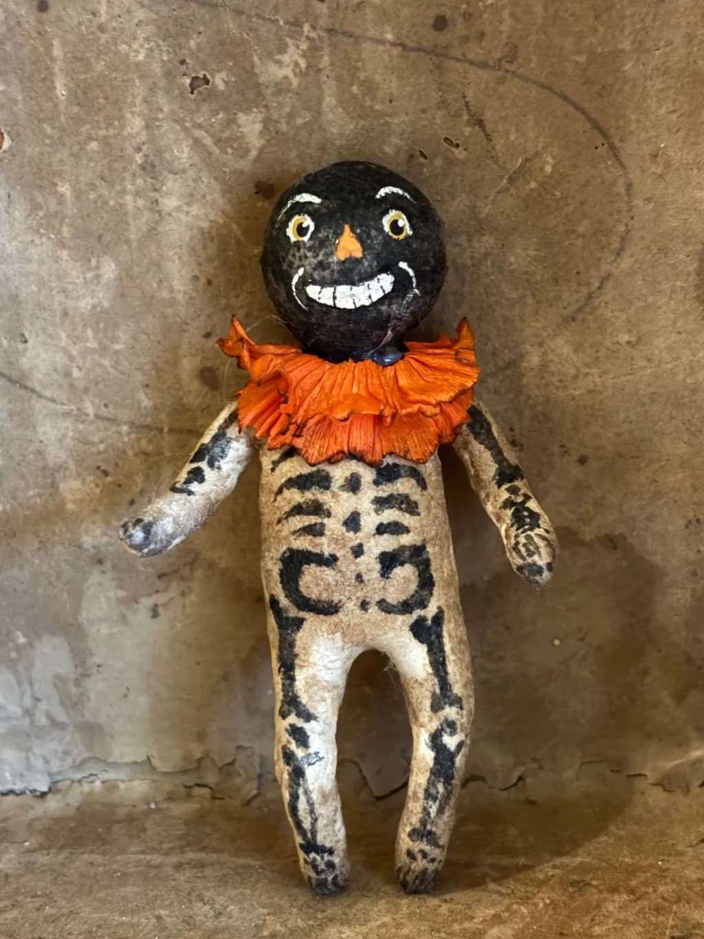 Whimsical Skeleton Doll with Pumpkin Collar: A Unique Halloween Art Piece
