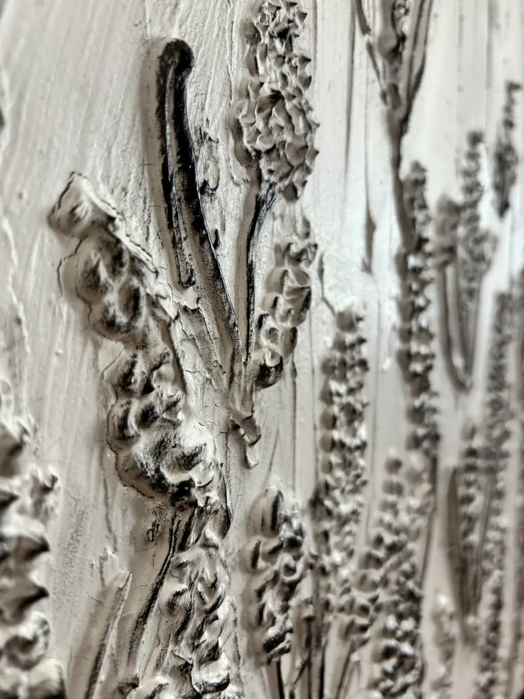 Whispers of Nature: Textured Floral Relief in Monochrome Elegance