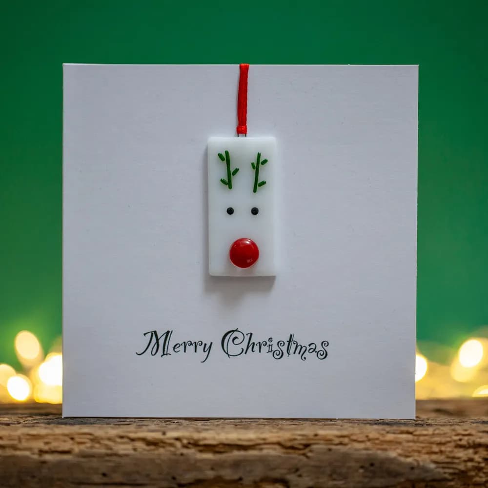 Whimsical Reindeer Christmas Card with Cheerful Red Nose and Festive Green Accents