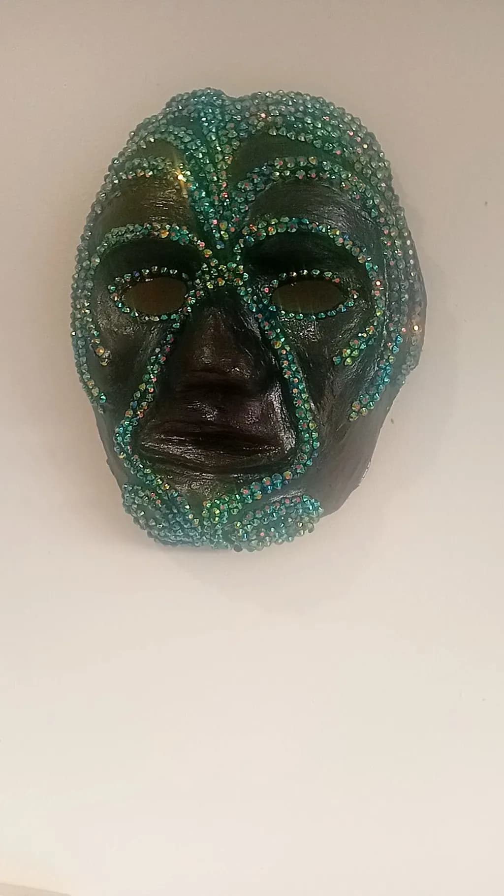 Tribal Elegance: A Unique Beaded Mask for Artistic Home Decor