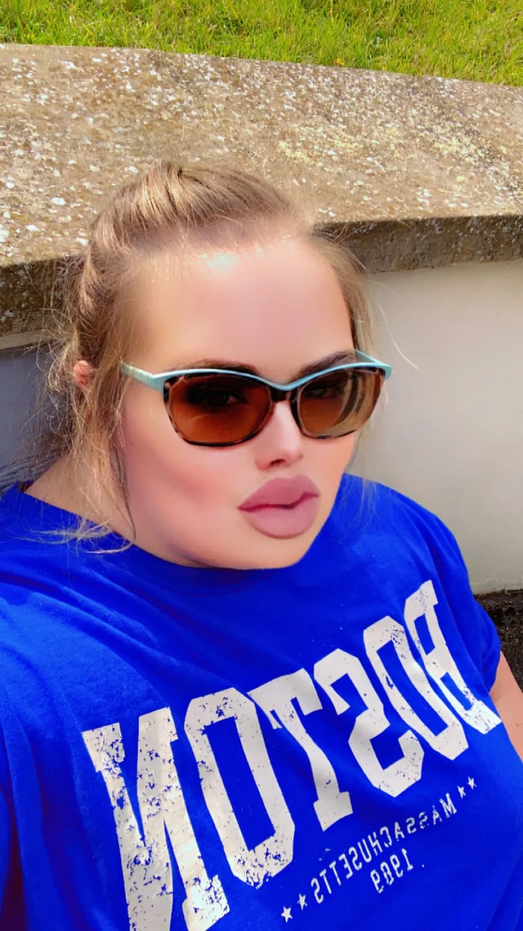 Sunlit Serenity: A Portrait of Confidence and Style in Blue