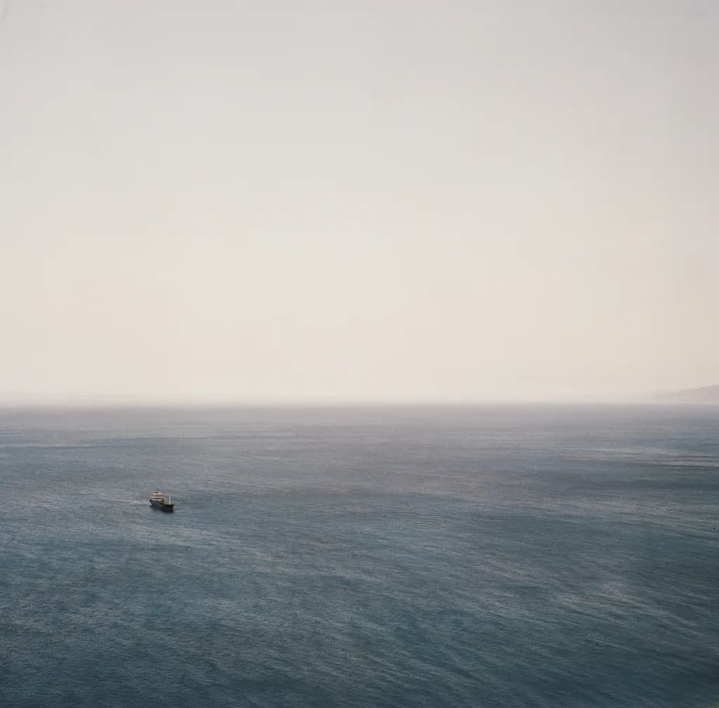 "Drifting Dreams: A Serene Voyage Across the Endless Blue"