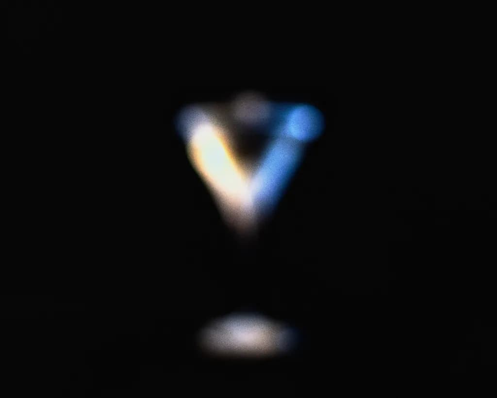Ethereal Reflections: A Blurred Dance of Light and Shadow