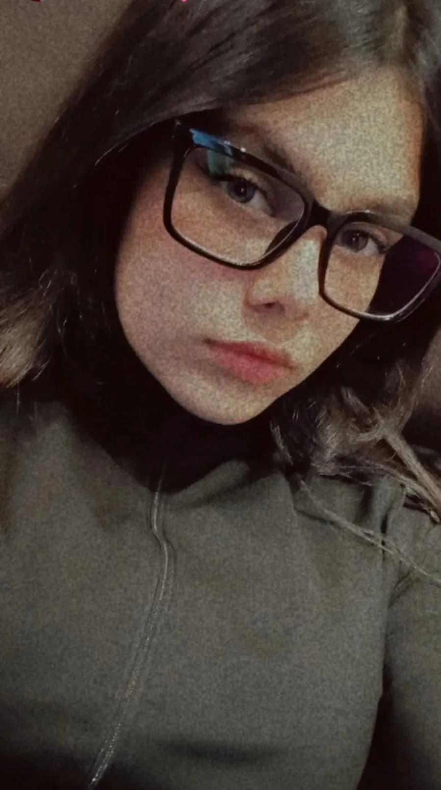 Whispers of Introspection: A Close-Up Portrait in Glasses