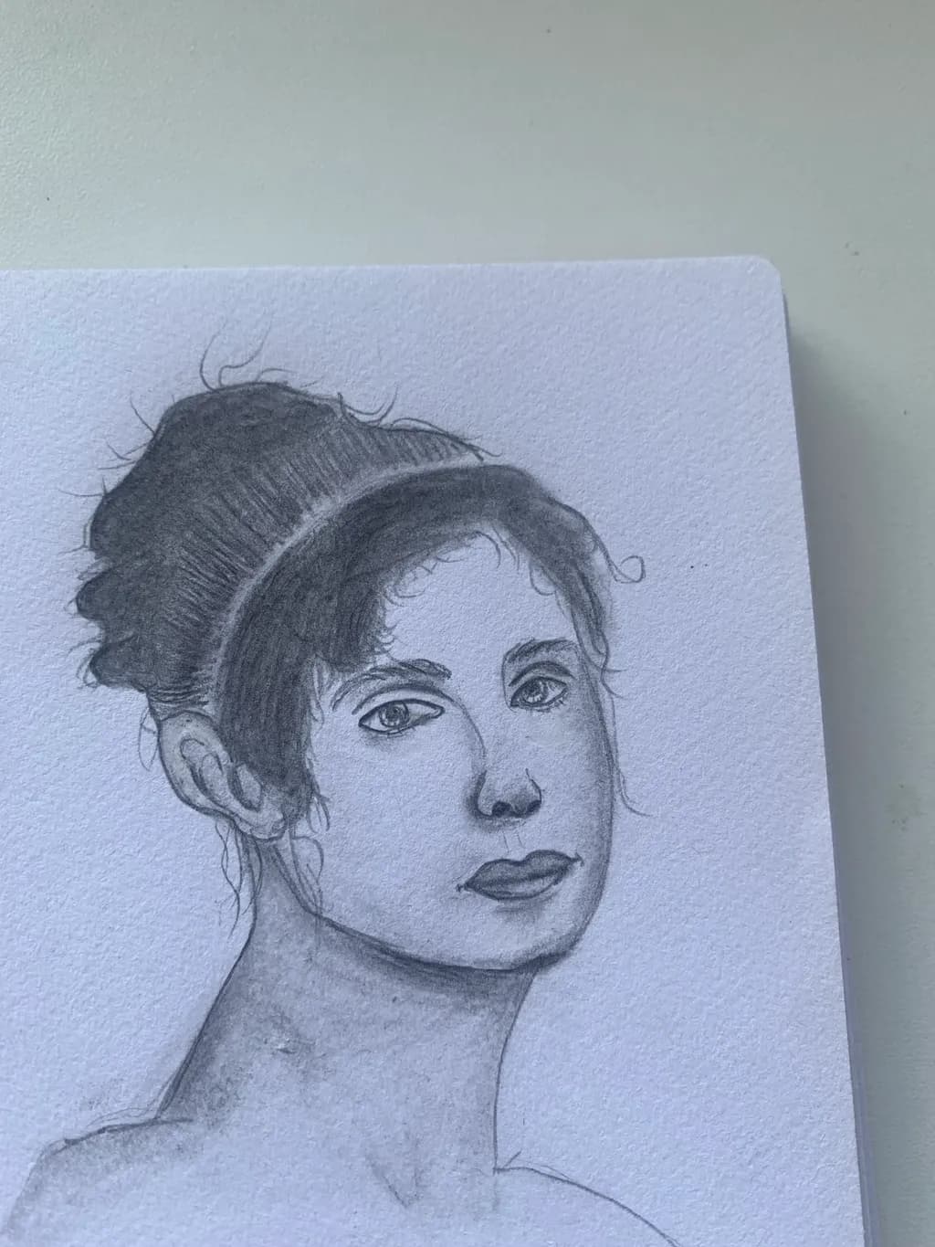 Whispers of Elegance: A Portrait in Pencil and Shadow