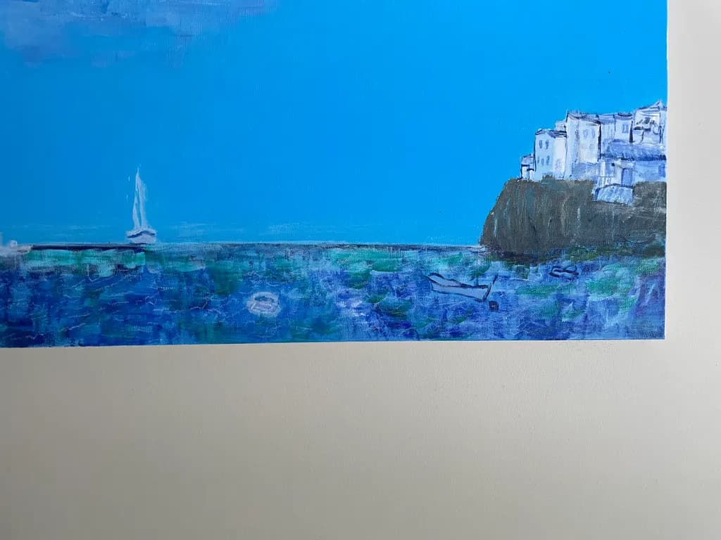 Coastal Serenity: A Tranquil Blue Landscape with Boats and Architecture by the Sea