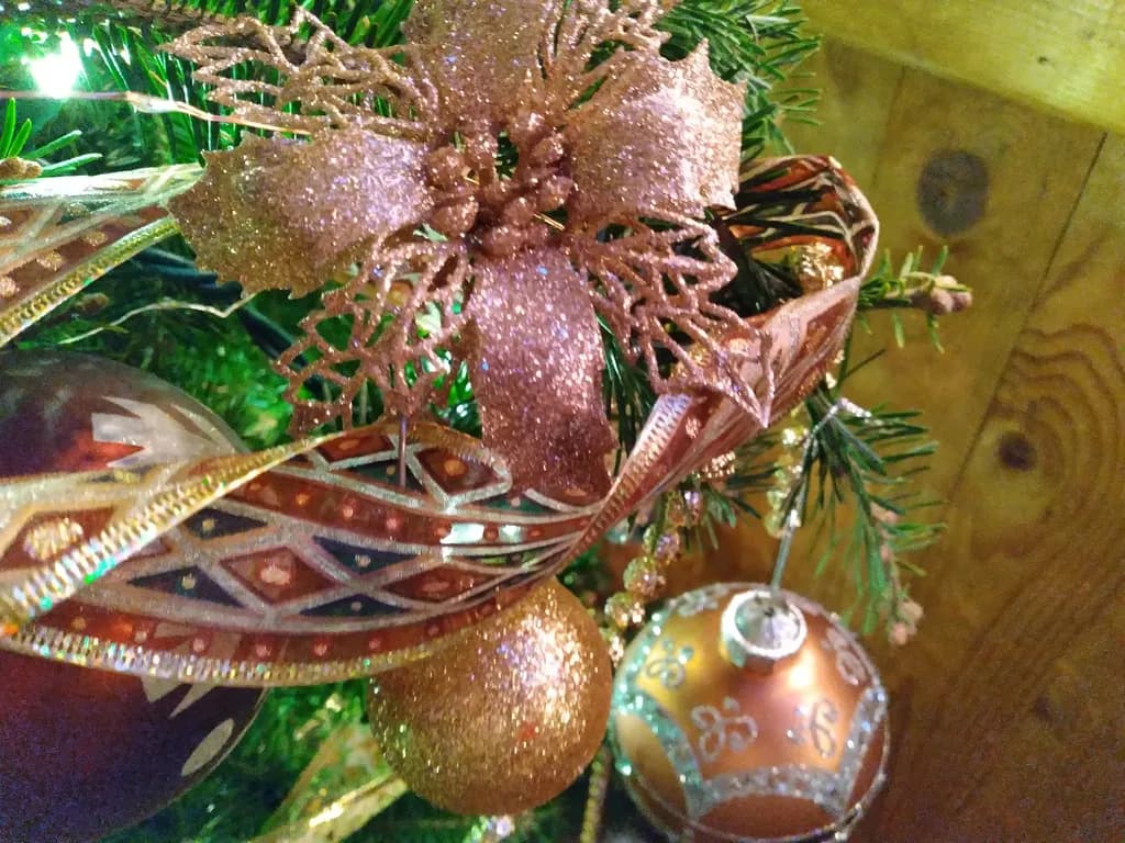 Glistening Holiday Elegance: A Festive Ornamentation of Sparkling Gold and Rich Textures
