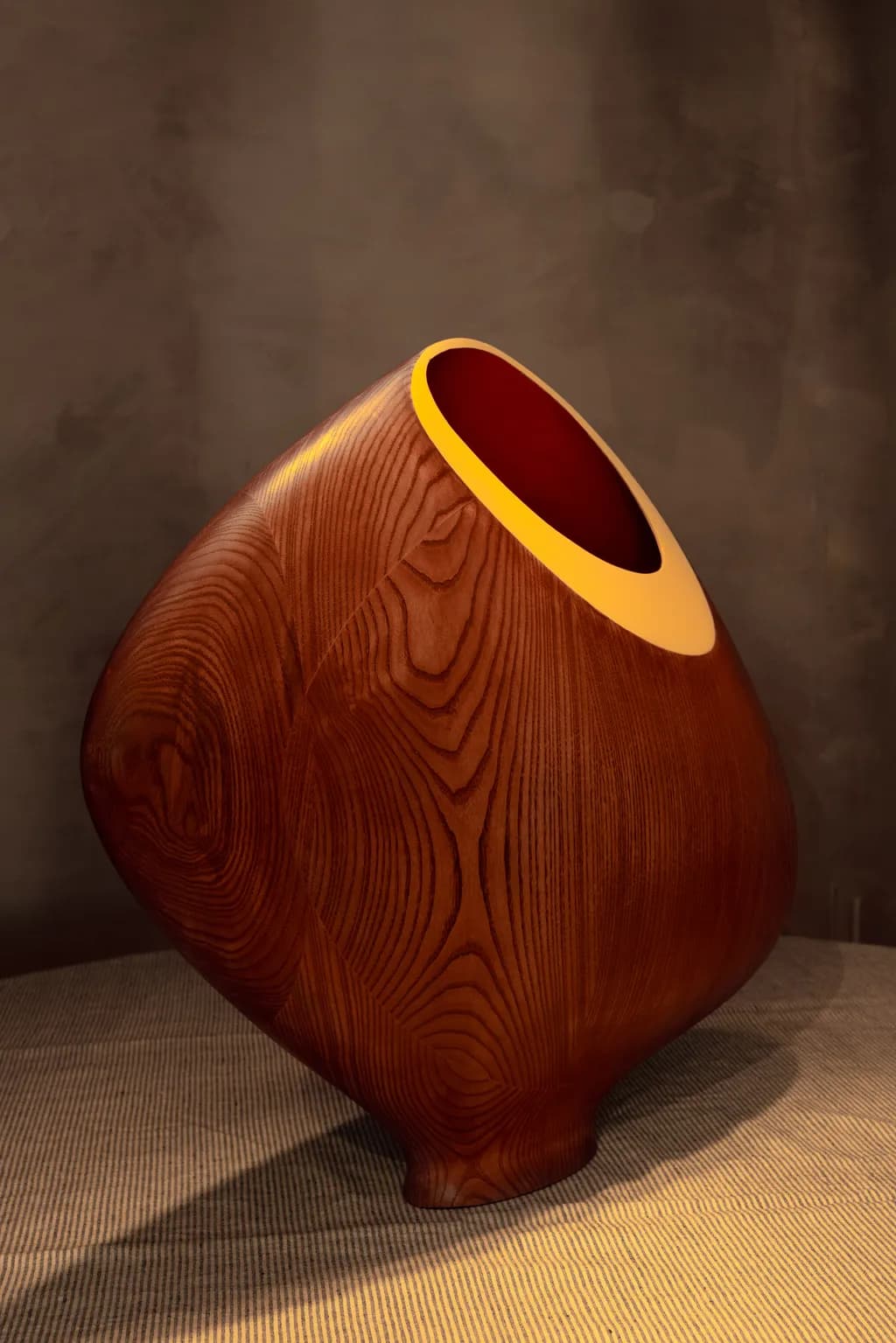 Elegant Curves: A Contemporary Wooden Vessel with Vibrant Accents