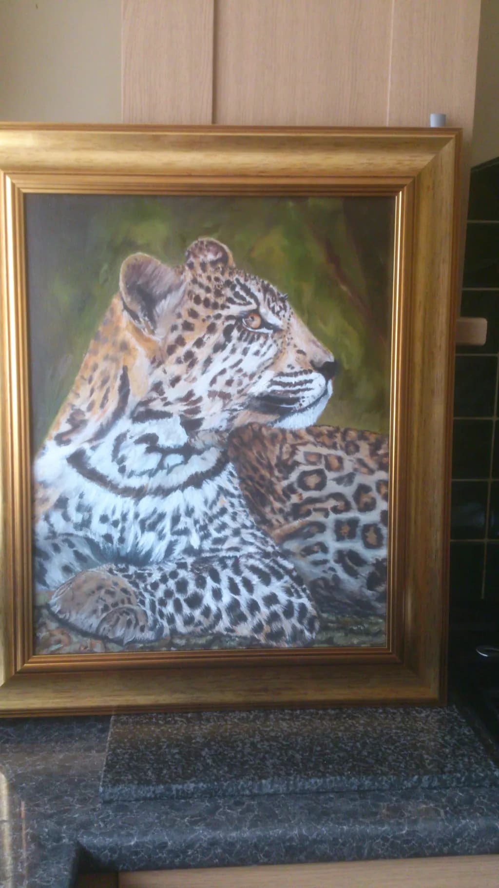 Majestic Gaze: A Realistic Portrait of a Leopard in Nature's Embrace