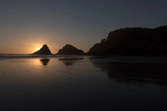 Serene Sunset Reflections on the Beach: A Tranquil Landscape Experience