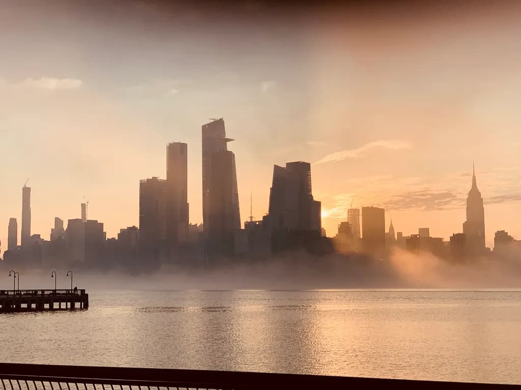 Misty Cityscape Sunrise