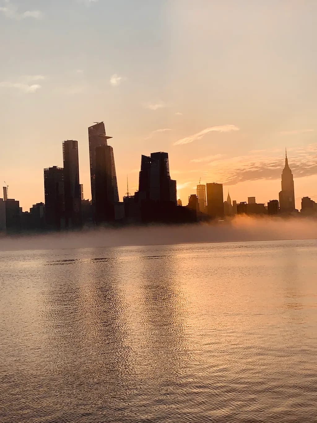 Mist over Sunset Cityscape
