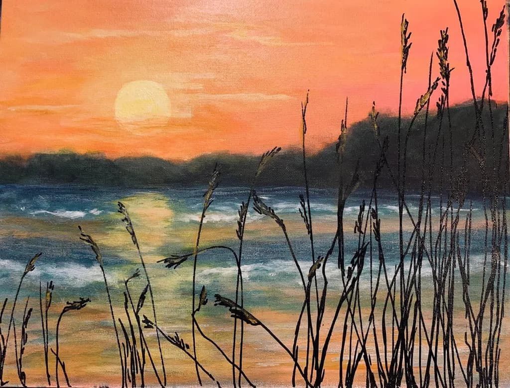Whispers of the Sunset: A Serene Coastal Evening with Silhouetted Grasses