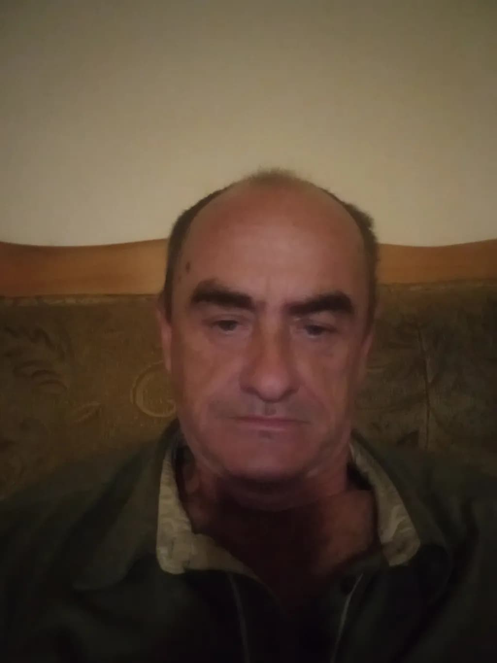 Reflective Gaze: A Casual Portrait of Contemplation in Indoor Serenity