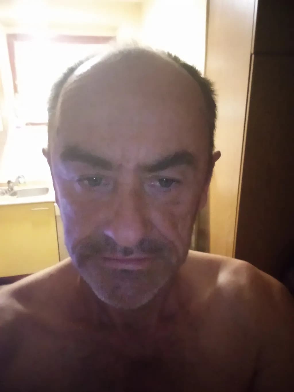 Introspection: A Close-Up Portrait of a Man's Serious Expression
