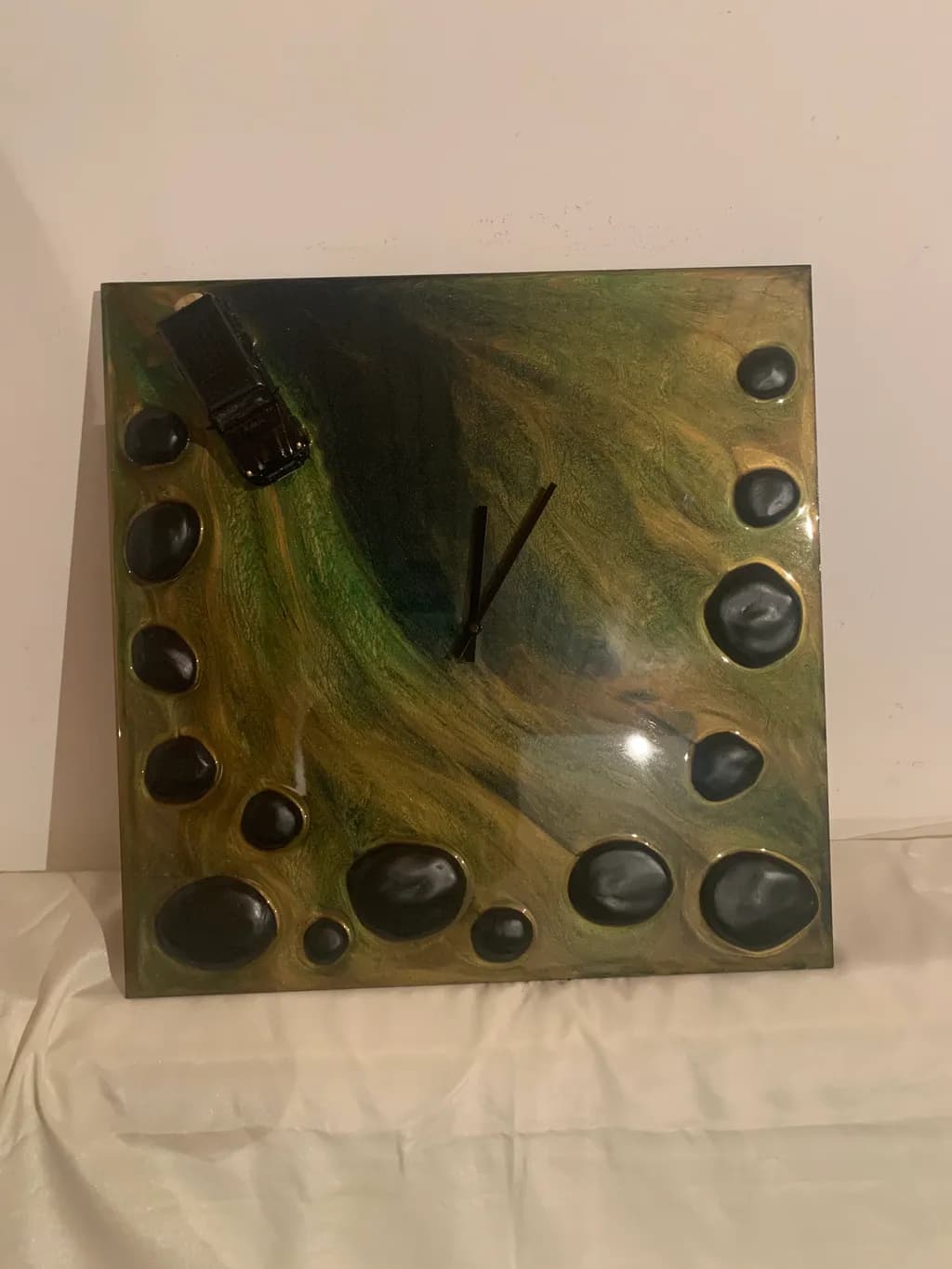 Timeless Journey: A Unique Artistic Clock with Textured Stones and Vibrant Swirls