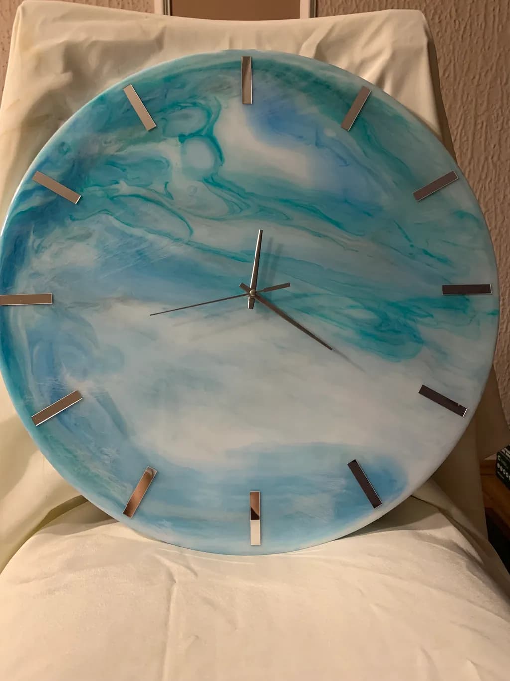 Serene Blue Swirl: A Modern Decorative Clock for Artistic Spaces